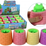 Antistress-Spielzeug grüne Frosch in der Tonne