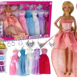 Puppe mit langen blonden Haaren und Zubehör