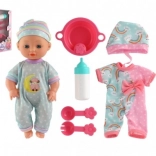 Babypuppe mit festem Körper und Zubehör, 25 cm