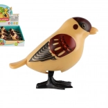 Springender Vogel mit Schlüssel 11 cm