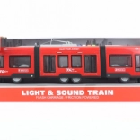 Rote batteriebetriebene Straßenbahn mit Effekten