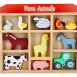 Holzset mit Bauernhoftieren im Rahmen