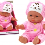 Kleine Babypuppe im rosa Outfit mit Hasenmützchen