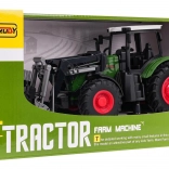 Grüner Traktor mit Greifer