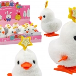 Aufziehbares Springhühnchen mit Stern