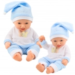 Puppe Baby in blauem Pyjama mit Mütze mit Bommel
