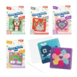 Set zum Kreuzstich-Sticken mit verschiedenen Motiven in der Box