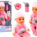 Baby-Puppe mit rosa Kleidung und Soundeffekten